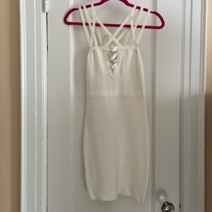 White bandage dress by Bebe with strappy shoulder detail